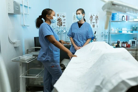 Two Female Nurses Having a Discussion